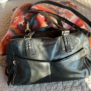 Cole Haan black leather crossbody bag with gold hardware